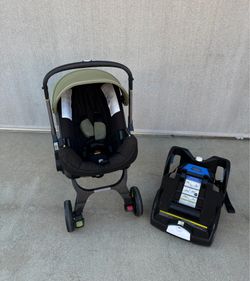 Doona Infant Car Seat Stroller with Base