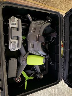 DJI drone with goggles and extras
