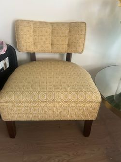 2 yellow accent chairs