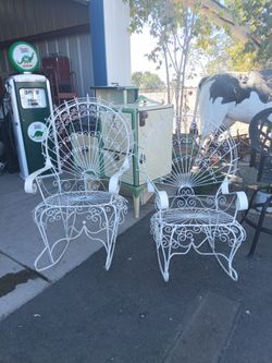 Antique His and Hera Rocking Peacock Chairs