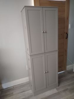 Brand new wood Ashley pantry style organizer. Built.