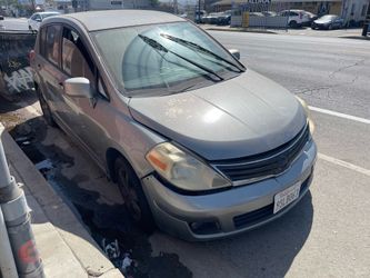2012 Nissan versa 1.8 automatic with 110,000 mile for Parts and transmission suspension doors hood bumper