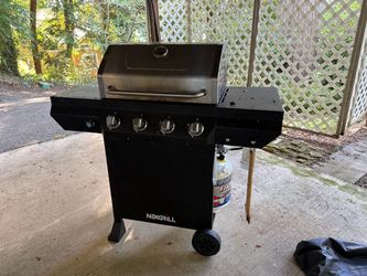 Free new 4 burners BBQ grill with a filled propane tank.