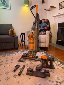Dyson vacuums, Upright and Hand w/ wall mount