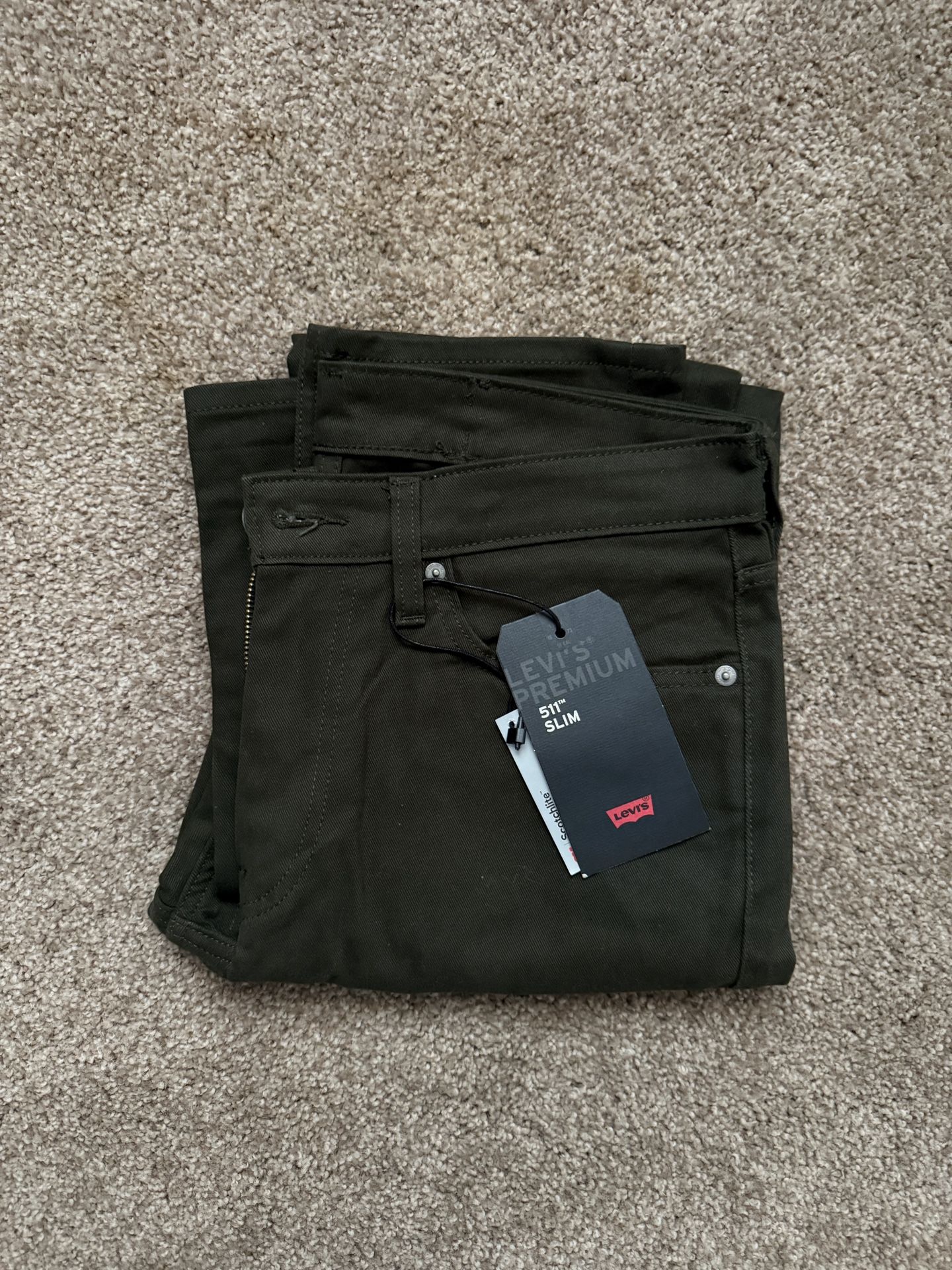 Levi’s 511 dark olive slim fit jeans 34x34