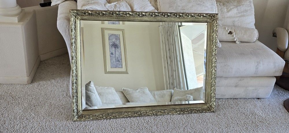 Antique mirror by J.A. Olson Company