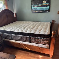 Hardwood queen bed frame with new firm queen mattress