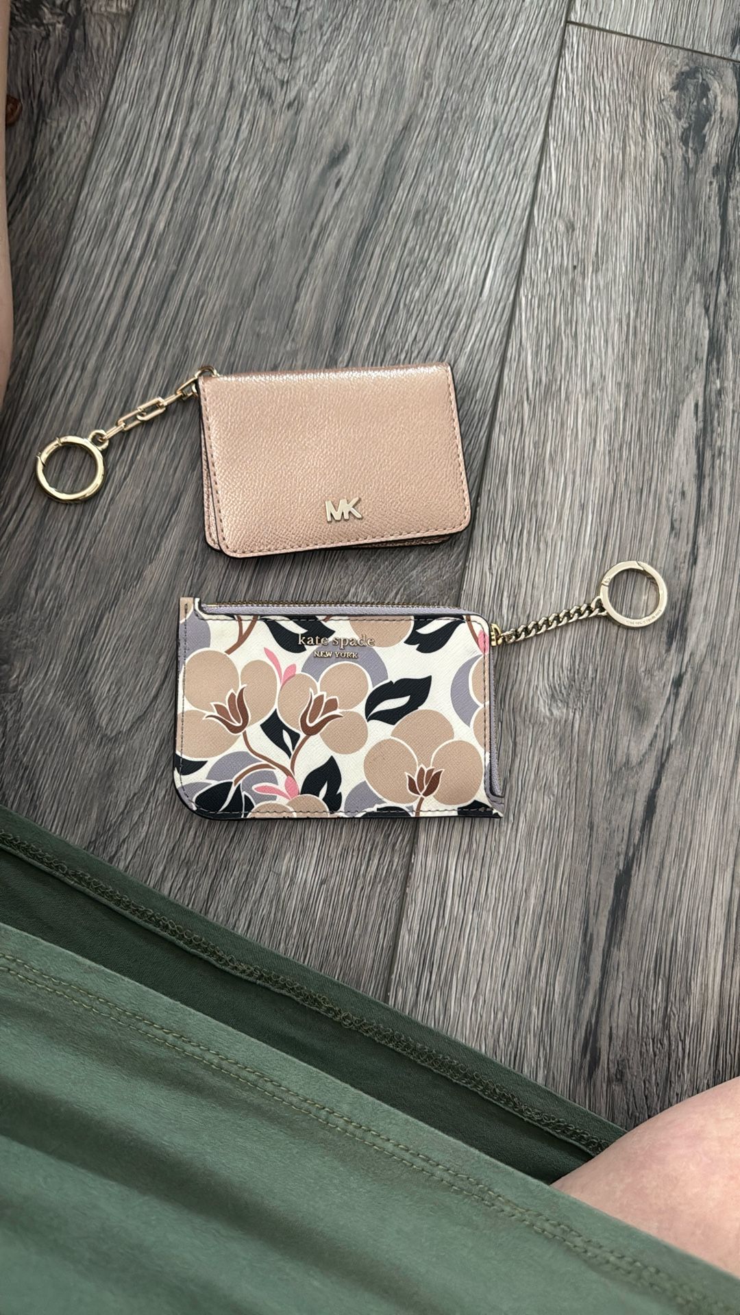 Two Small Wallets Hand