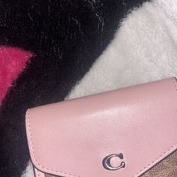 baby pink coach wallet .