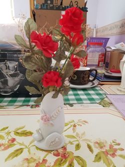 Small vase with artificial roses