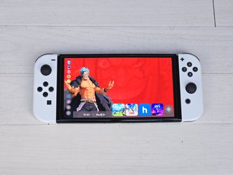 Nintendo Switch OLED 200 Games + Android TV OS 