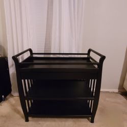 Changing Table,has Two Shelves  And Apper Drawer black Color Like new No Scratches 