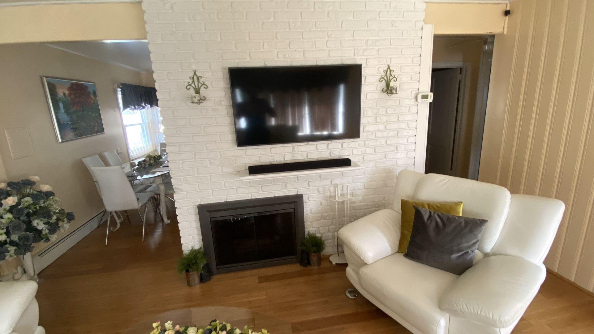 White leather couch set with coffee tables