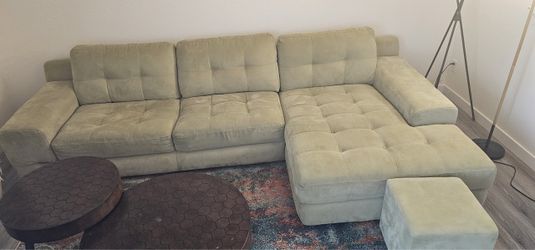 L shape 4- seater sofa - $275 with two round coffee tables.