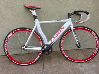 56 in.  Jamis white and red track bike