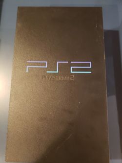 PS2 with 9 games and 2 controllers