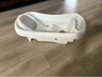Baby bathtub and bottle warmer
