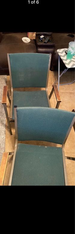 A set of four office chairs