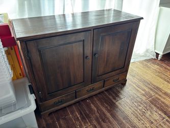 Dark Wood Cabinet with Drawers