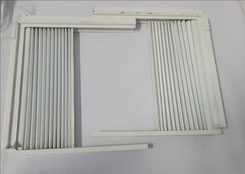 Side panels for a window air conditioner