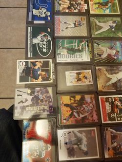 Baseball football and basketball cards