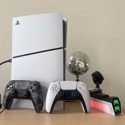 PlayStation 5 with bonus controller, games, and charger. Read description.