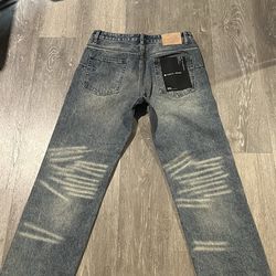 purple jeans black tag