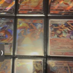 Pokemon Yugioh cards Charizard blue eyes white dragon
