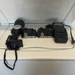 Hitachi flashlight with 2 batteries & charger..works great..Senior Owned..cleaning house