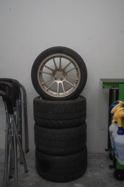 18x10.5 + 15 Wheels ENKEI GTC01RR