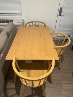 Solid wood dining table + 3 chairs — $120
