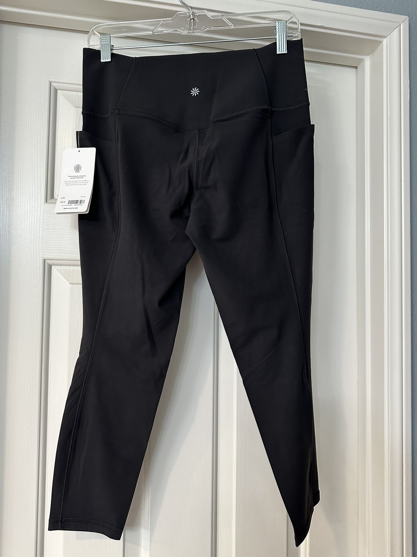 Athleta Salutation Stash Pocket II 7/8 Tight