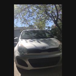 2013 Kia Rio (read the ad)