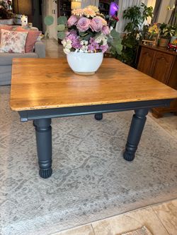 Antique Dining table solid oak with black legs. 2 leaves