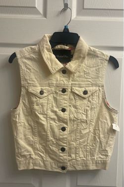 Brand new Girls ivory vests sizes S & M Juniors $6.00 each