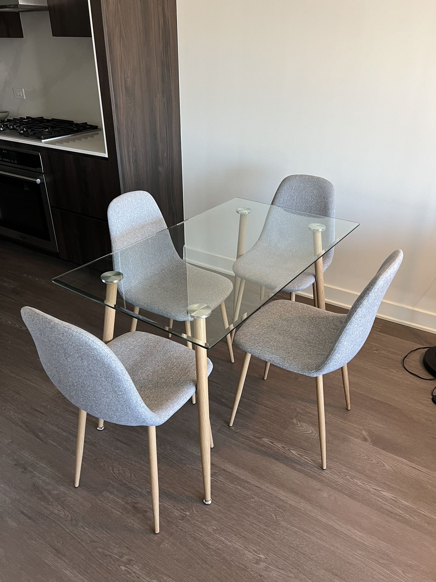 Glass Table and 4 Chairs For Sale