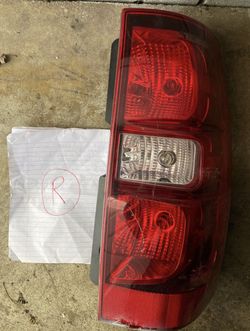 Suburban, Tahoe 07-14 OEM Tail Light (Right)