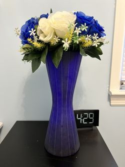 Blue Vase And Flowers