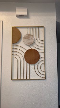 Gold and beige wall decor