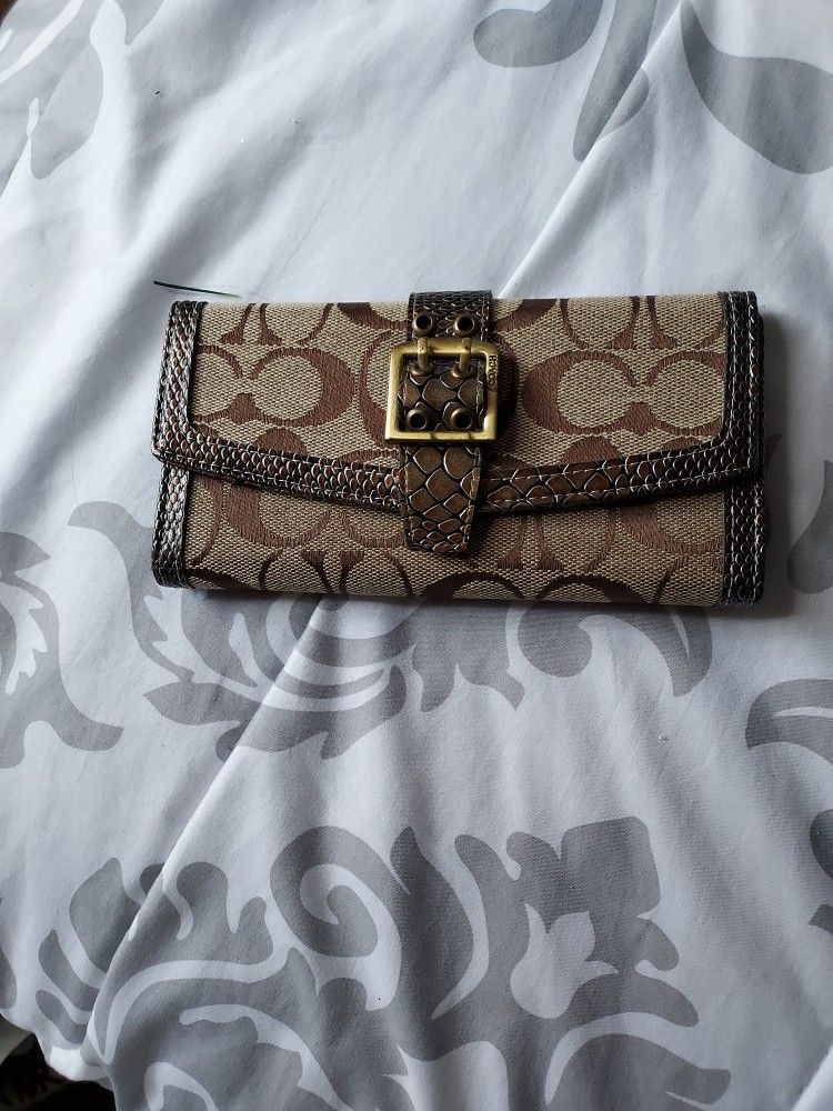 NEW. COACH CLUTCH PURSE $10.00