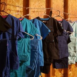 Women's Scrubs, Size  Pairs Medium, Large And Some Small. 9 Pairs.