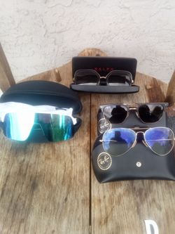 Designer sunglasses, Ray Ban, Oakley, Prada