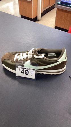 Green Nike size 10.5