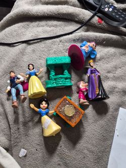 Mcdonald's happy meal.Snow white characters, eight of them