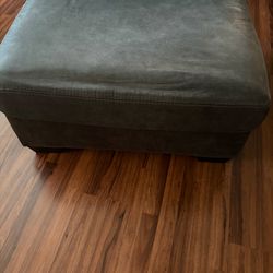 Dark Gray Ottoman – $50