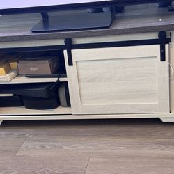 Signature Design by Ashley Camiburg Farmhouse Rectangular Coffee Table with Sliding Barn Doors