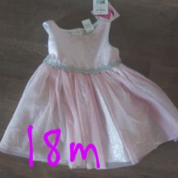 Beautiful pink sparkle party dress.Size 18 mo. No low-ball offers please. $2 off for pickup.