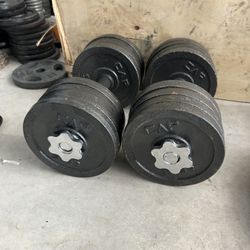 pair of 45lb adjustable dumbbells with plates. 90lb in total  $90