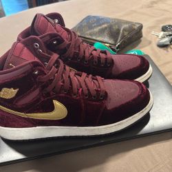 Nike Air Jordan 1 Retro High "Heiress" sneakers featuring a maroon velvet