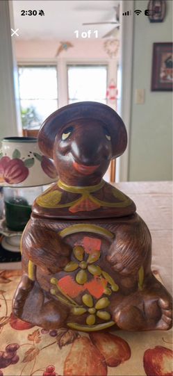 This is a vintage Mid-Century California Pottery ceramic turtle figural cookie jar from the 1960s.